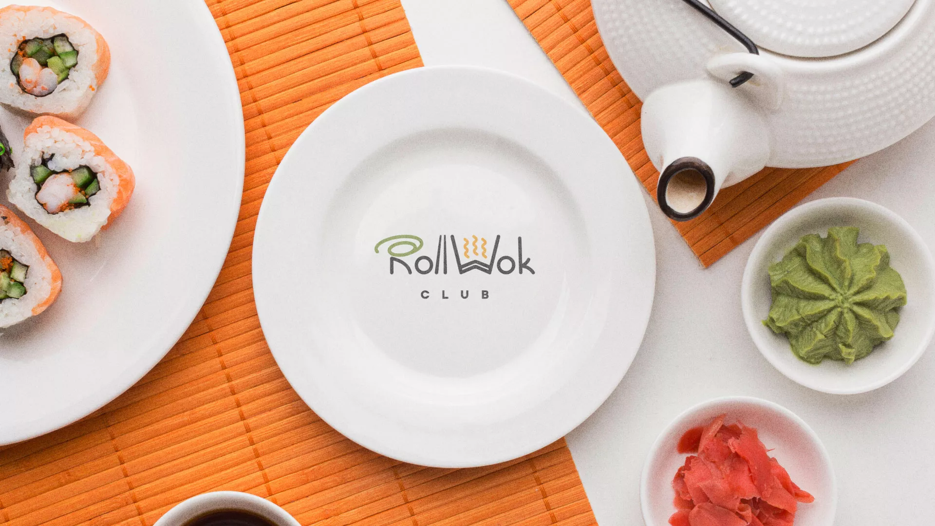 Разработка логотипа и фирменного стиля в Таре для суши-бара «Roll Wok Club» Разработка логотипа и фирменного стиля в Таре для суши-бара «Roll Wok Club»